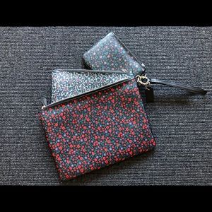 Coach Trio of 3 wristlets